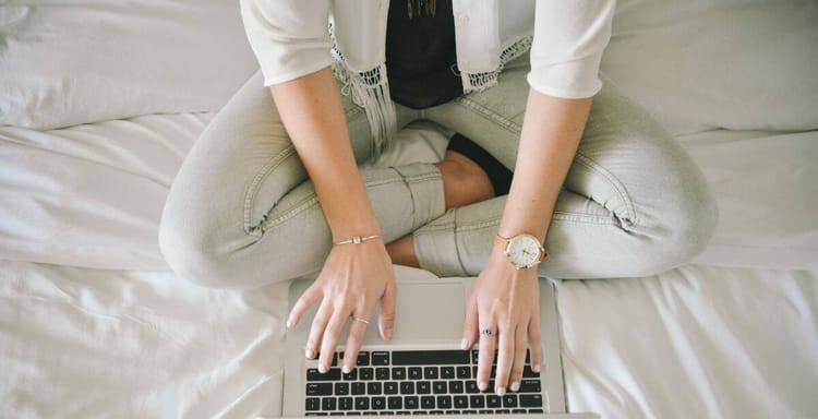 Laptop with text counting feature on screen, creative work, productivity tools, digital writing software.