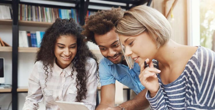 Engaged students using a digital word counter for writing and editing.