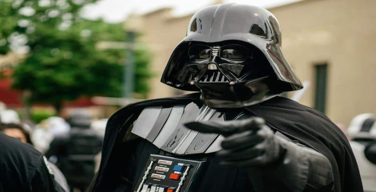 Darth Vader costume with helmet and cape.