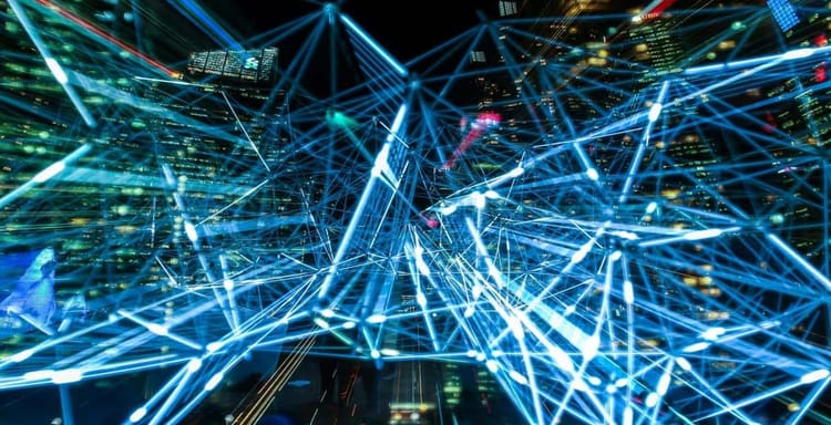 Futuristic digital cityscape with interconnected data lines and bright city lights.