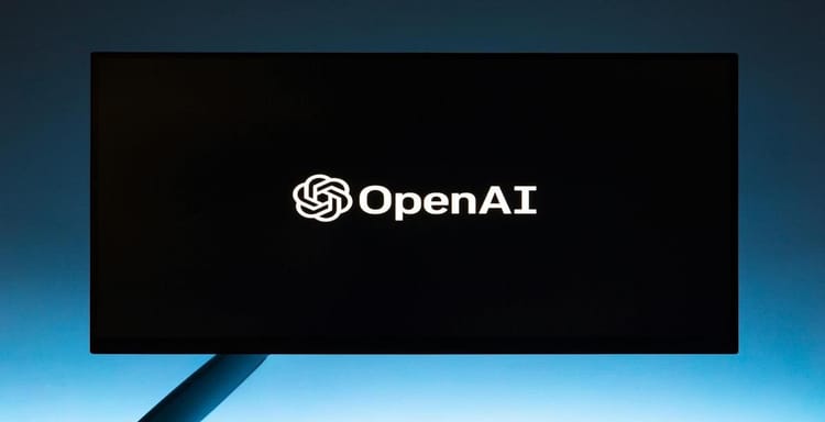 OpenAI logo on a screen, symbolizing artificial intelligence development.