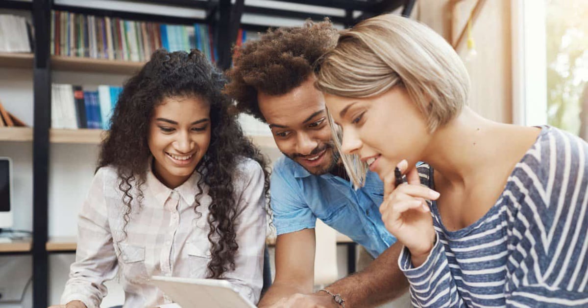 Engaged students using a digital word counter for writing and editing.