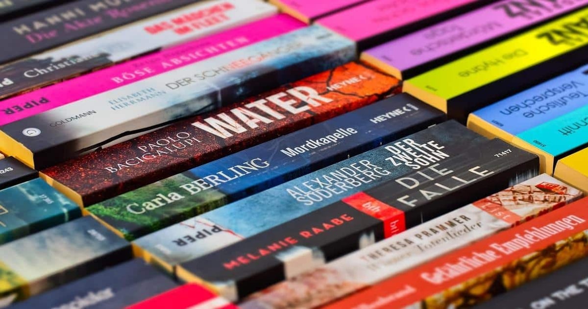 Compact image of colorful book spines with titles, highlighting reading and literature themes.